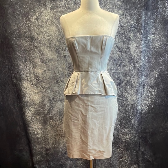 BCBGMaxAzria Dresses & Skirts - Elegant Strapless Peplum Dress - Cream
